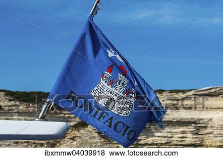 Stock Photo - "Flag and coat of Bonifacio, chalk cliffs, Corsica, France, Europe". Fotosearch