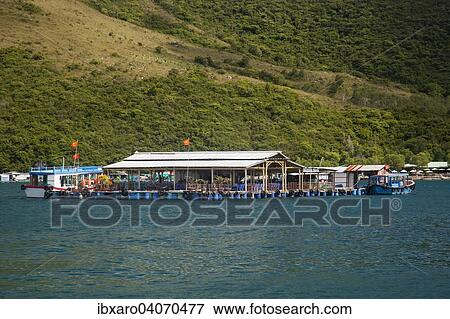 "Floating houses off the island of Ho Ca Tri Nguyen, Nha Trang Bay, South China Sea, Vietnam, Asia" View Large Photo Image Stock Photo - "Floating houses off the island of Ho Ca Tri Nguyen, Nha Trang Bay, South China Sea, Vietnam, Asia". Fotosearch