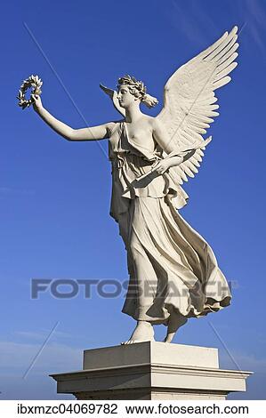 "Floating Victoria sculpture, goddess of Victory, in the palace gardens of the Schweriner Schloss castle, Schwerin, Mecklenburg-Western Pomerania, Germany, Europe" View Large Photo Image Stock Image - "Floating Victoria sculpture, goddess of Victory, in the palace gardens of the Schweriner Schloss castle, Schwerin, Mecklenburg-Western Pomerania, Germany, Europe". Fotosearch