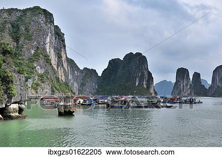 Stock Photography - "Floating village, Halong Bay, Vietnam, Southeast Asia, Asia". Fotosearch