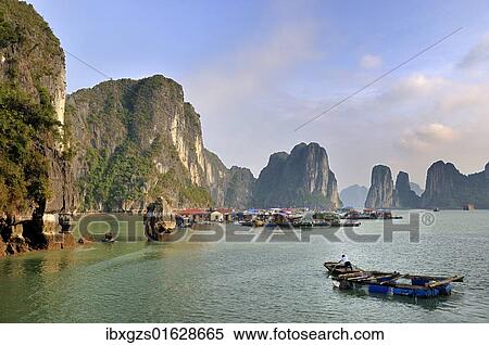 Stock Photography - "Floating village, Halong Bay, Vietnam, Southeast Asia, Asia". Fotosearch