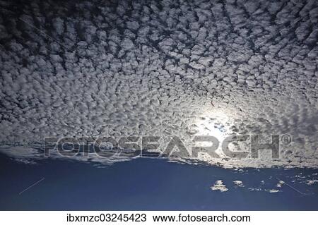 "Fluffy clouds or cirrocumulus clouds, with the sun, Bentin, Rognitz, Mecklenburg-Western Pomerania, Germany, Europe" View Large Photo Image Stock Image - "Fluffy clouds or cirrocumulus clouds, with the sun, Bentin, Rognitz, Mecklenburg-Western Pomerania, Germany, Europe". Fotosearch