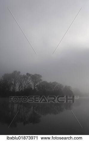 Stock Image - "Fog covered lake near Wernau, Baden-Wuerttemberg, Germany, Europe". Fotosearch