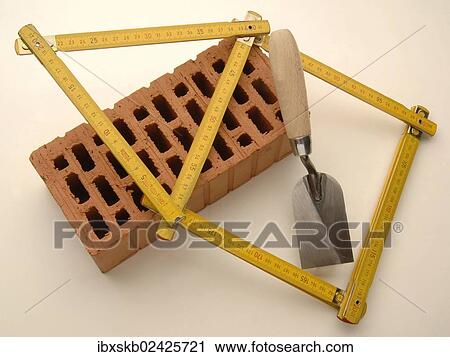 "Folding rule in the shape of a house, with a red brick and a smoothing trowel" View Large Photo Image Stock Image - "Folding rule in the shape of a house, with a red brick and a smoothing trowel". Fotosearch