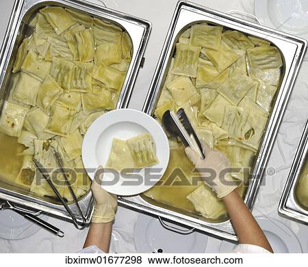 "Food distribution, Swabian specialty food, filled pasta, in a lunchroom" View Large Photo Image Stock Photo - "Food distribution, Swabian specialty food, filled pasta, in a lunchroom". Fotosearch