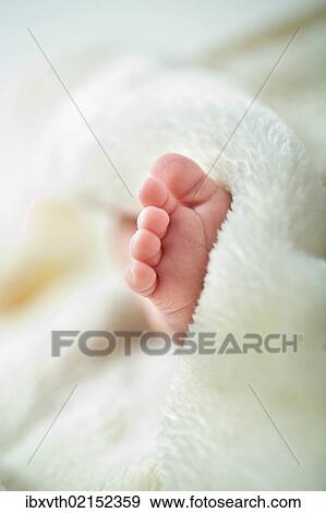 Stock Photo - "Foot of a baby, 1 month". Fotosearch