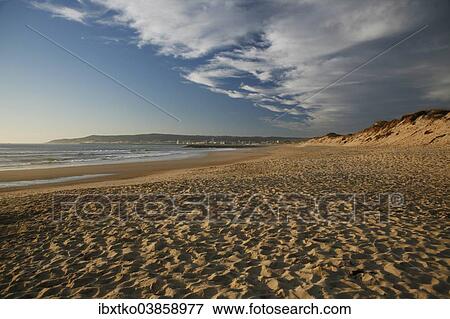 "Footprints in the sand, beach and clouds in the evening light, in Figueira da Foz, Portugal Atlantic coast, Portugal, Europe" View Large Photo Image Stock Photo - "Footprints in the sand, beach and clouds in the evening light, in Figueira da Foz, Portugal Atlantic coast, Portugal, Europe". Fotosearch