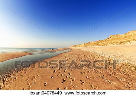 "Footprints on the Weststrand beach, red cliff, Kampen, Sylt, North Frisia, Schleswig-Holstein, Germany, Europe" View Large Photo Image Stock Photo - "Footprints on the Weststrand beach, red cliff, Kampen, Sylt, North Frisia, Schleswig-Holstein, Germany, Europe". Fotosearch