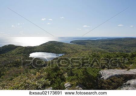 "Forest and sea views from the summit of Champlain Mountain, 328 m, over The Bowl lake, hiking trail, Bear Brook Trail, Acadia National Park, Maine, New England, USA, North America" View Large Photo Image Stock Image - "Forest and sea views from the summit of Champlain Mountain, 328 m, over The Bowl lake, hiking trail, Bear Brook Trail, Acadia National Park, Maine, New England, USA, North America". Fotosearch