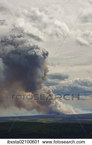 Stock Image - "Forest fire following a lightning strike near Fairbanks, Alaska, USA". Fotosearch