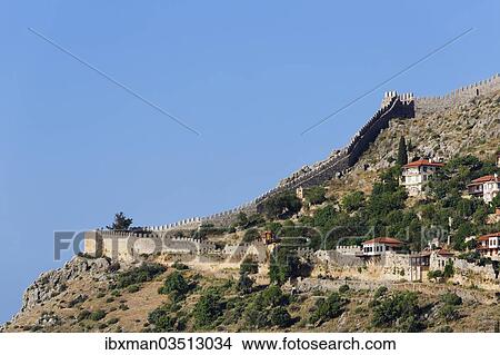 Picture - "Fortress walls or ramparts on the hill, Alanya Castle, Tophane quarter, Tophane, Alanya, Turkish Riviera, Province of Antalya, Mediterranean Region, Turkey, Asia". Fotosearch