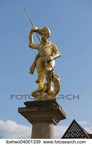 Stock Photo - "Fountain figure of St. George, 16th century, Georg Fountain, Market Square, Eisenach, Thuringia, Germany, Europe". Fotosearch