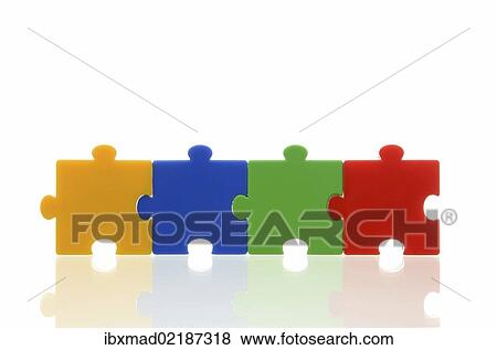 "Four different coloured puzzle pieces, connected, symbolic image, team, series" View Large Photo Image Stock Photo - "Four different coloured puzzle pieces, connected, symbolic image, team, series". Fotosearch