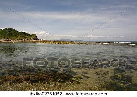 Stock Image - "French Atlantic Coast at low tide, near Saint-Jean-de-Luz, Aquitaine, Departement Pyrenees-Atlantiques, France, Europe". Fotosearch
