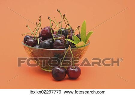 Fresh cherries in a glass bowl View Large Photo Image Stock Photo - Fresh cherries in a glass bowl. Fotosearch