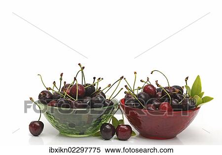 Stock Photography - Fresh cherries in two glass bowls. Fotosearch