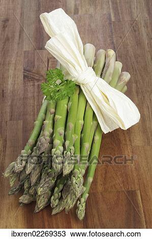 Fresh unpeeled green asparagus View Large Photo Image Stock Image - Fresh unpeeled green asparagus. Fotosearch