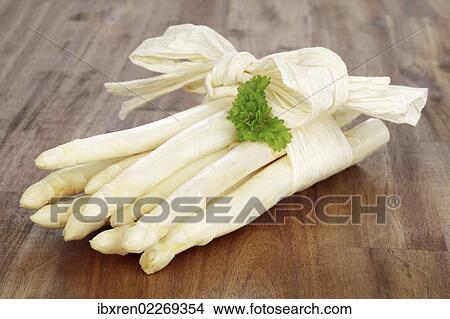 Fresh unpeeled white asparagus View Large Photo Image Picture - Fresh unpeeled white asparagus. Fotosearch