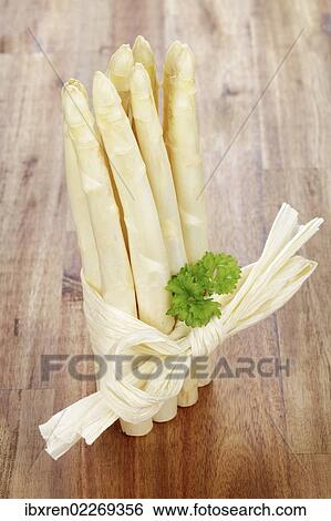 Fresh unpeeled white asparagus View Large Photo Image Stock Photograph - Fresh unpeeled white asparagus. Fotosearch