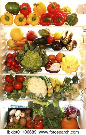 Fridge filled with different kinds of vegetables and fruit View Large Photo Image Stock Photo - Fridge filled with different kinds of vegetables and fruit. Fotosearch