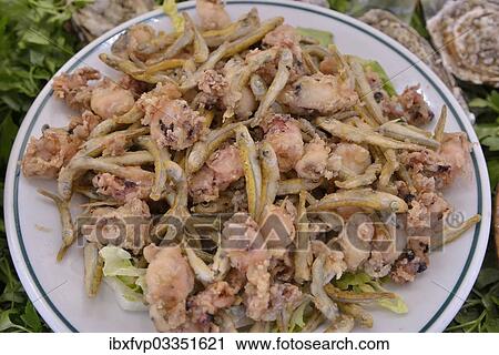 "Fried fish, display at a fish restaurant in the fishing port of Calp or Calpe, Calp, Costa Blanca, Alicante province, Spain, Europe" View Large Photo Image Stock Image - "Fried fish, display at a fish restaurant in the fishing port of Calp or Calpe, Calp, Costa Blanca, Alicante province, Spain, Europe". Fotosearch