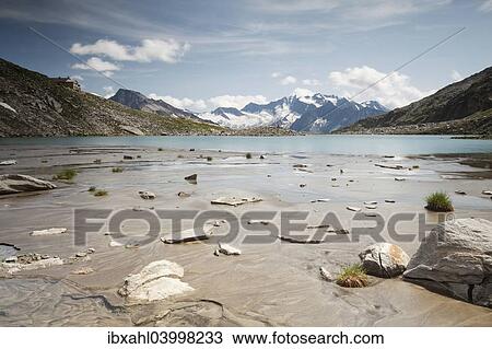 Stock Image - "Friesenbergsee lake with views of the Zillertal Alps, Ginzling, Tyrol, Austria, Europe". Fotosearch