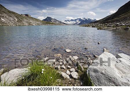 "Friesenbergsee lake with views of the Zillertal Alps, Ginzling, Tyrol, Austria, Europe" View Large Photo Image Stock Photography - "Friesenbergsee lake with views of the Zillertal Alps, Ginzling, Tyrol, Austria, Europe". Fotosearch