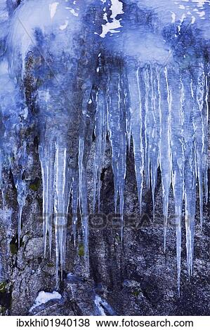 Stock Photo - "Frozen waterfall near Grotfjorden and Tromvik, Norway, Europe". Fotosearch