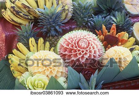 Stock Image - "Fruit carving, ornately carved fruit, Ko Samui, Thailand, Asia". Fotosearch
