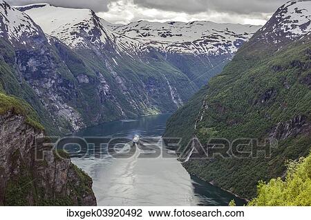 "Geirangerfjord, Seven Sisters waterfall, Dei Sju Systrene in Norwegian, Knivsfla farm centre right, cruise ship, More og Romsdal province, Vestland or Western Norway, Norway, Europe" View Large Photo Image Stock Image - "Geirangerfjord, Seven Sisters waterfall, Dei Sju Systrene in Norwegian, Knivsfla farm centre right, cruise ship, More og Romsdal province, Vestland or Western Norway, Norway, Europe". Fotosearch