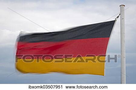 "German flag fluttering in the wind, Germany, Europe" View Large Photo Image Stock Image - "German flag fluttering in the wind, Germany, Europe". Fotosearch