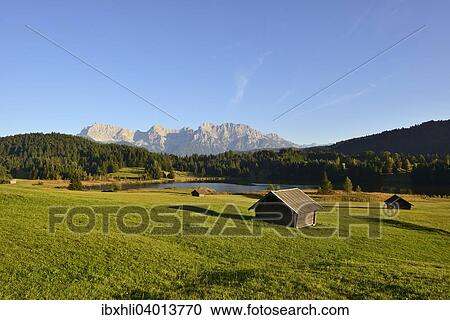 Stock Image - "Geroldsee Lake or Wagenbruchsee Lake, in front of the Karwendel Range, Krun, Werdenfelser Land, Upper Bavaria, Bavaria, Germany, Europe". Fotosearch