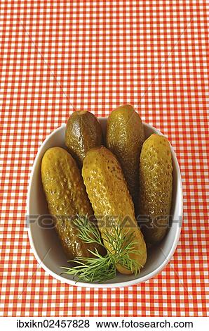 Gherkins in a white porcelain bowl View Large Photo Image Stock Photo - Gherkins in a white porcelain bowl. Fotosearch
