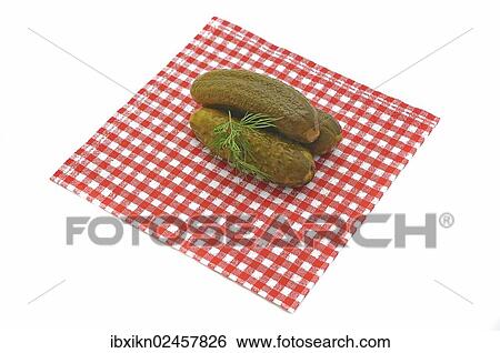 Gherkins lying on a napkin View Large Photo Image Stock Photograph - Gherkins lying on a napkin. Fotosearch