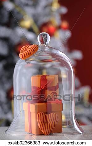 Gifts under a glass bell with Christmas ambience View Large Photo Image Stock Image - Gifts under a glass bell with Christmas ambience. Fotosearch