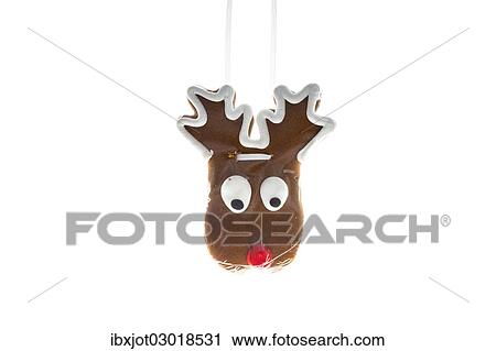 Gingerbread heart in the shape of a reindeer head View Large Photo Image Stock Image - Gingerbread heart in the shape of a reindeer head. Fotosearch