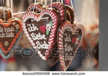 "Gingerbread hearts with the lettering """"ich liebe dich"""", German for """"I love you""""" View Large Photo Image Stock Photo - "Gingerbread hearts with the lettering """"ich liebe dich"""", German for """"I love you""""". Fotosearch