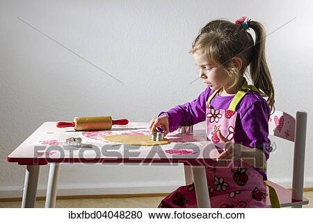 "Girl, 3 years, baking Christmas cookies" View Large Photo Image Stock Image - "Girl, 3 years, baking Christmas cookies". Fotosearch