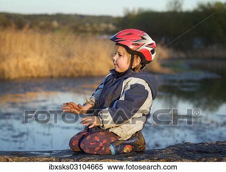 "Girl, 4, covered with mud while sitting on a stone beside a pond, Crailsheim, Hohenlohe, Baden-Wurttemberg, Germany, Europe" View Large Photo Image Stock Photography - "Girl, 4, covered with mud while sitting on a stone beside a pond, Crailsheim, Hohenlohe, Baden-Wurttemberg, Germany, Europe". Fotosearch