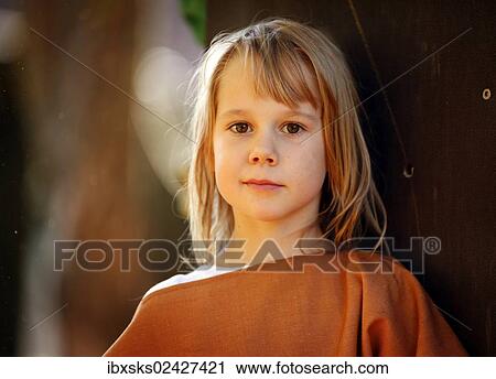 Stock Image - "Girl, 7 years, portrait, outdoors". Fotosearch