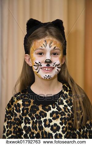 Stock Image - "Girl, 8 years old, dressed up as a cat, carnival, Germany, Europe". Fotosearch