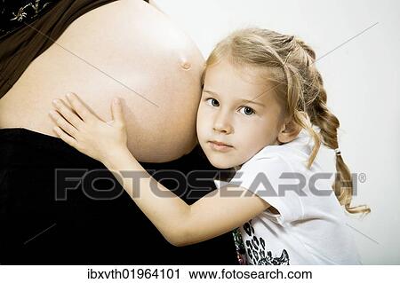 Girl and belly of pregnant mother View Large Photo Image Stock Image - Girl and belly of pregnant mother. Fotosearch