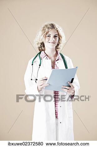 Girl dressed as a carer with a stethoscope View Large Photo Image Stock Image - Girl dressed as a carer with a stethoscope. Fotosearch