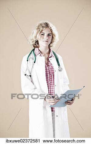 Girl dressed as a carer with a stethoscope View Large Photo Image Stock Image - Girl dressed as a carer with a stethoscope. Fotosearch