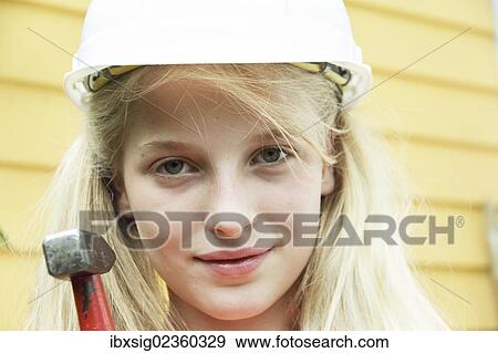 Girl dressed up as a construction worker View Large Photo Image Stock Photo - Girl dressed up as a construction worker. Fotosearch
