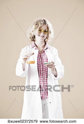 Girl holding a petri dish wearing a lab coat View Large Photo Image Stock Photo - Girl holding a petri dish wearing a lab coat. Fotosearch