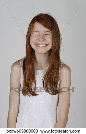 Girl laughing with her eyes closed View Large Photo Image Stock Image - Girl laughing with her eyes closed. Fotosearch