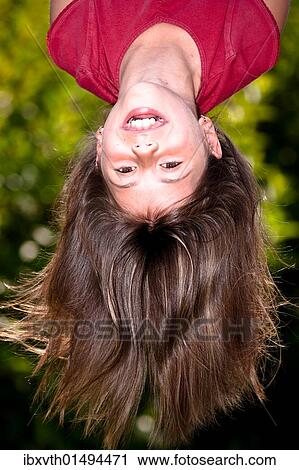 Stock Image - Girl playing on the playground. Fotosearch