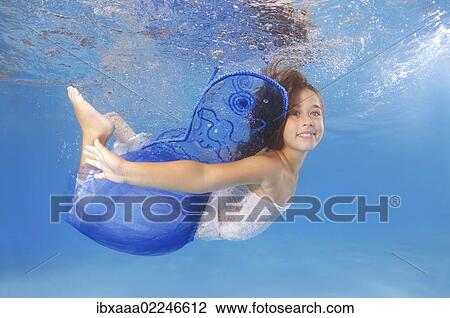 "Girl presenting underwater fashion in pool, Odessa, Ukraine, Eastern Europe, Europe" View Large Photo Image Stock Image - "Girl presenting underwater fashion in pool, Odessa, Ukraine, Eastern Europe, Europe". Fotosearch