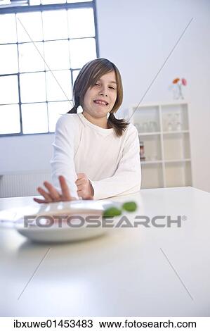 Girl pushing away a soup plate in disgust View Large Photo Image Stock Image - Girl pushing away a soup plate in disgust. Fotosearch